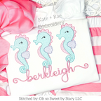Seahorse Trio Sketch Stitch Embroidery Design: Three pastel sketch stitch seahorses above the name berkleigh in pink script on a white shirt