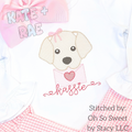 Girls Valentine's Day Puppy Sketch Stitch Embroidery Design: Sketch stitch puppy with a pink bow holding a pink envelope above the name Kassie on a white shirt