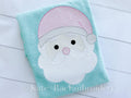 Santa Sketch Stitch Embroidery Design: Sketch stitch Santa face with a pink hat and white beard stitched on a mint shirt