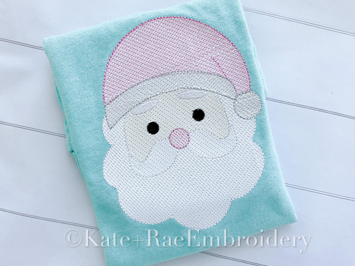 Santa Sketch Stitch Embroidery Design: Sketch stitch Santa face with a pink hat and white beard stitched on a mint shirt
